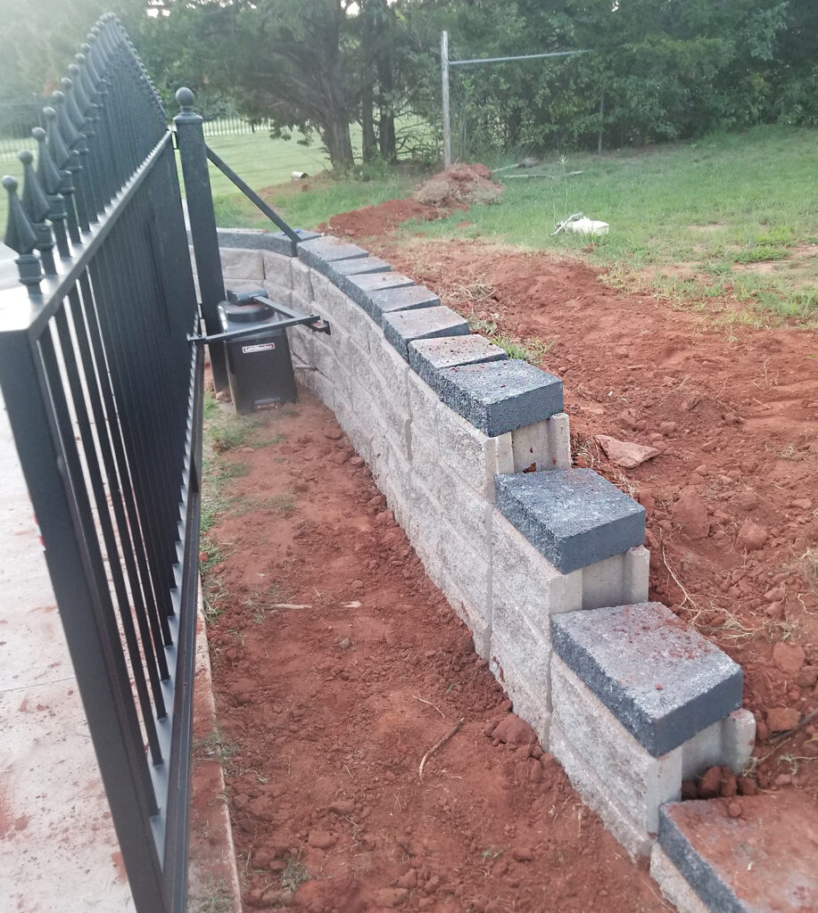 Custom retaining wall & electric gate construction